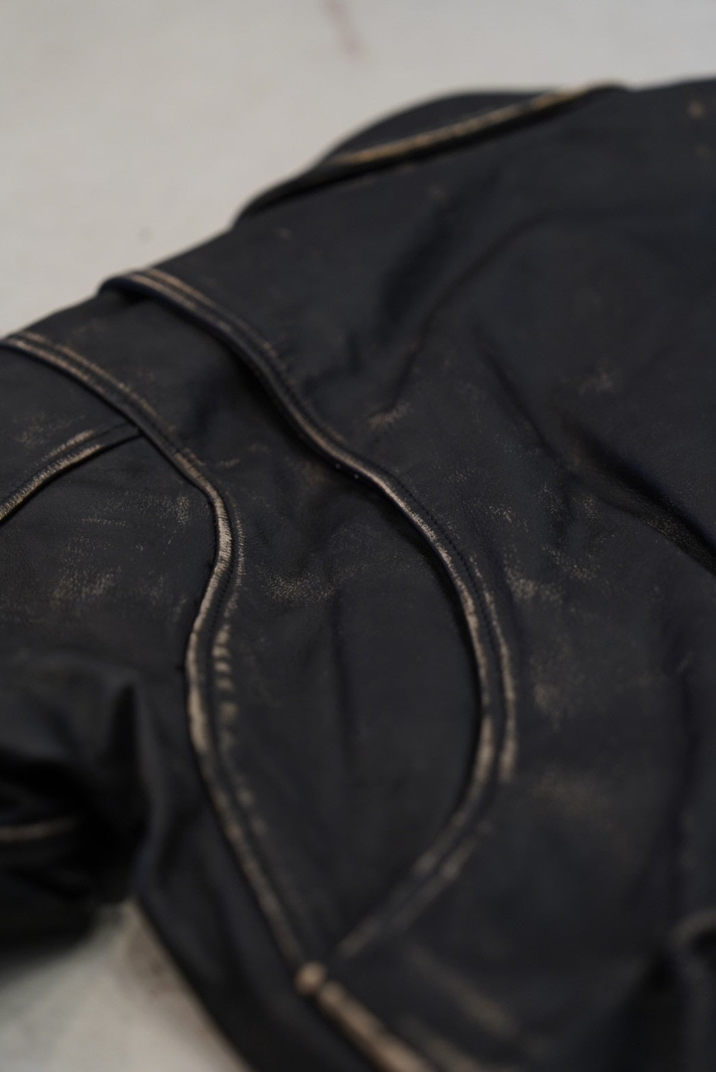 NVRFRGT DISTRESSED LEATHER BOMBER JACKET